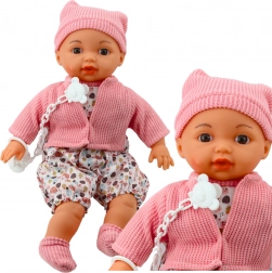 Baba rózsaszín kupakkal és cumival láncon 40 cm