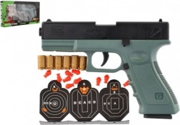 Habpatronos pisztoly céltáblával