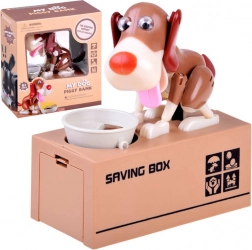 Interaktív persely kutya formájában, amely pénzt eszik