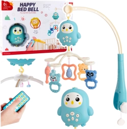 Zenes forgó kiságy fölé lámpácskával és csörgőkkel – kék