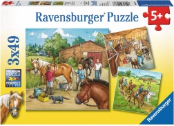 Ravensburger puzzle Egy nap a lovaknál 3x49 darab