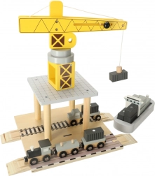 Fa daru kikötőhöz hajókkal és autókkal