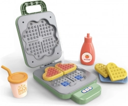 Zöld gofrikészítő kislányok háztartásába