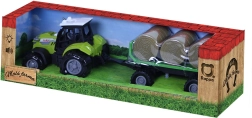 Traktor hanggal és fénnyel, pótkocsival és szalmakötegekkel