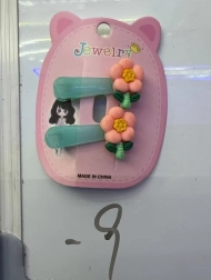 Hajcsat narancssárga virággal