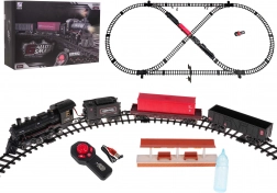 Vasútmodell füstölgő mozdonnyal, fénnyel és zenével