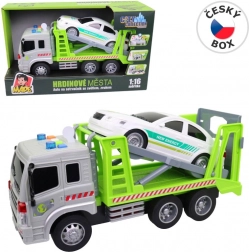 Vontatóautó lendkerekes járművel, fénnyel és hanggal