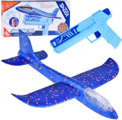 Szórakoztató habszivacs repülő LED világítással, kilövős pisztollyal
