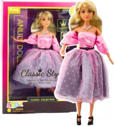 Anlily baba világos rózsaszín pöttyös ruhában mozgatható végtagokkal