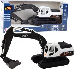 Nagy lánctalpas kotrógép fémből készült kanállal és mozgatható ízületekkel