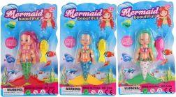 Hosszú hajú és csillogó ruhás sellő