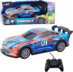 RC versenyautó világító karosszériával, narancs–türkiz