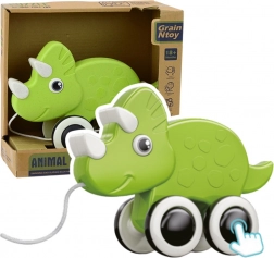 Zöld húzható dínó síppal