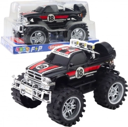 Hátsókerék-meghajtású terepjáró, nagy kerekek, piros–fekete