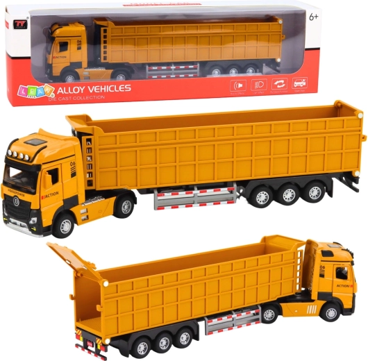 Fém sárga billenő tehergépkocsi-szerelvény fényekkel és hangokkal