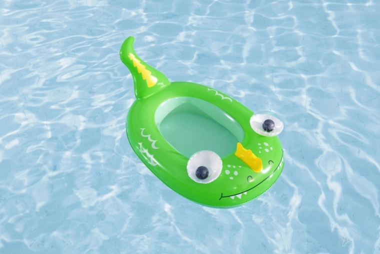 Vidám zöld sárkány a játékos evezéshez