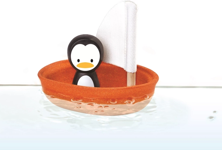 PlanToys vitorlás csónak pingvinnel