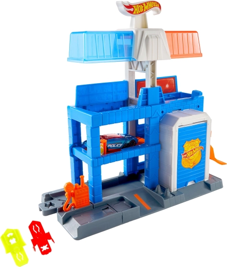 1:64-es fém rendőrautó a csomagban