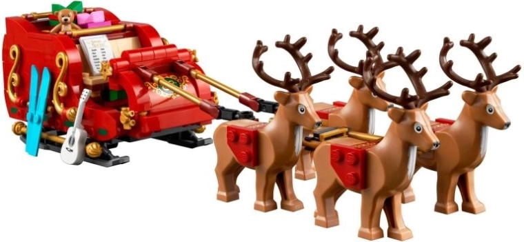 Részletgazdag piros szán arany akcentusokkal