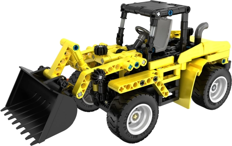 Működő homlokrakodó mozgatható kanállal