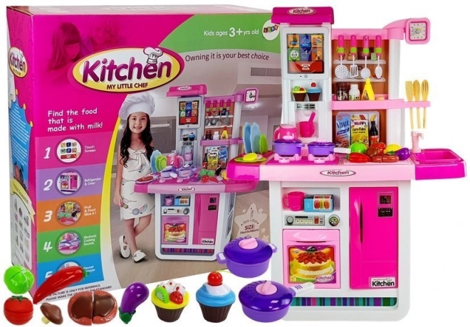 Rózsaszín gyerekkonyha vízzel és hangokkal