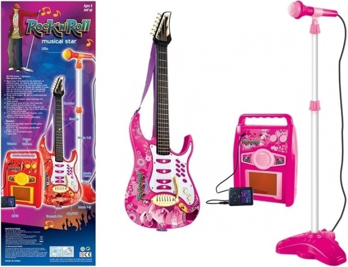 Rózsaszín elektromos gitár mikrofonnal és erősítővel gyerekeknek