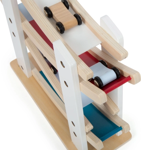 Négy színes kisautó a csomagban