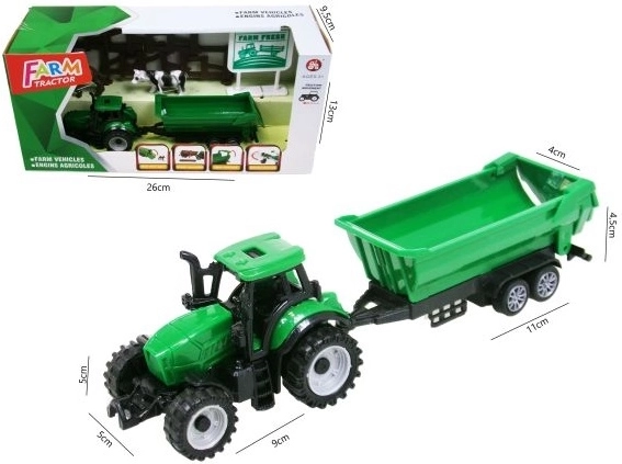 Zöld traktor utánfutóval és kiegészítőkkel