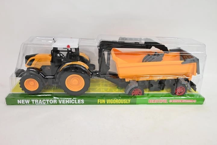 Traktor pótkocsival és rakodó markolóval