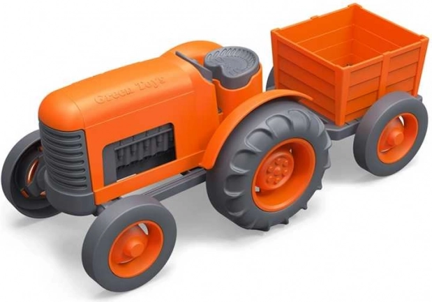 Narancssárga traktor pótkocsival a Green Toys-tól