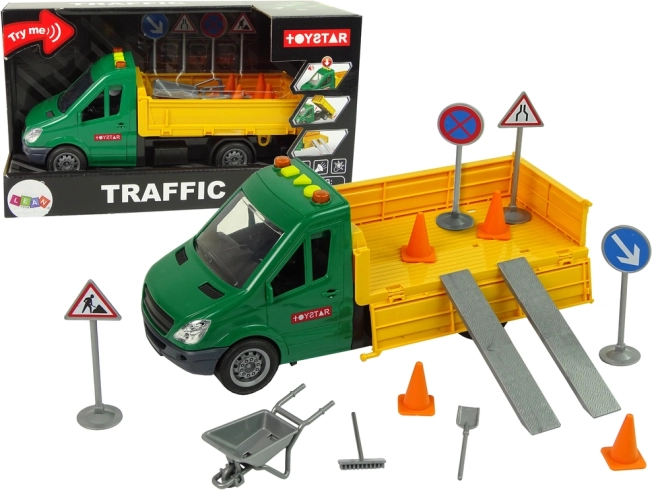 Útburkolaton közlekedő billenőplatós teherautó súrlódásos meghajtással és közlekedési kiegészítőkkel