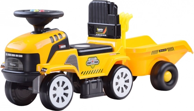 Lábbal hajtós traktor utánfutóval és dallamokkal gyerekeknek – Traktor