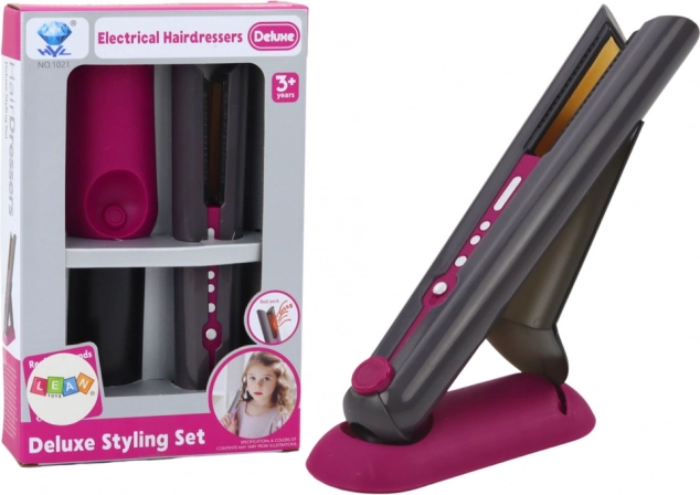 Játék hajvasaló tartóval, fénnyel és hanggal