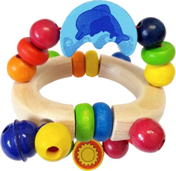 Fa csörgő delfinnel