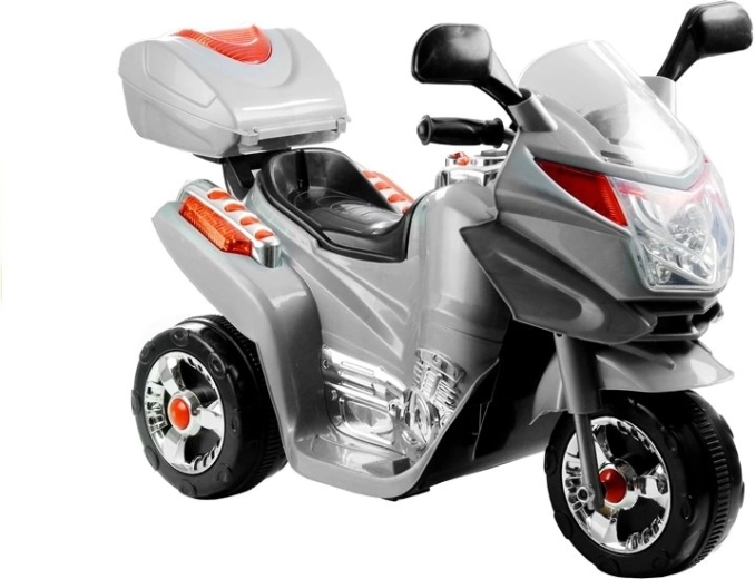 Ezüstszínű háromkerekű elektromos gyermekmotor