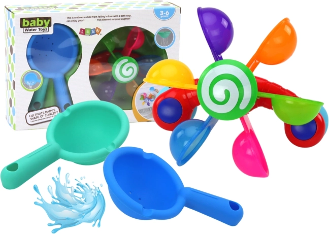 Forgó fürdőjáték színes tálkákkal és két kanállal