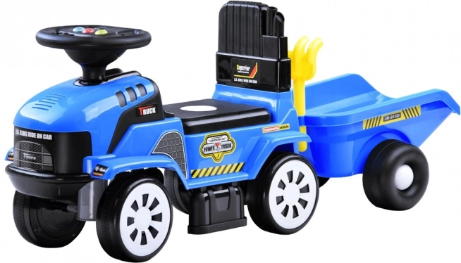 Lábbal hajtós traktor utánfutóval és dallamokkal gyerekeknek – Traktor