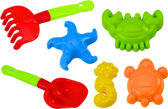 Homokozójáték készlet lapáttal, gereblyével és formákkal