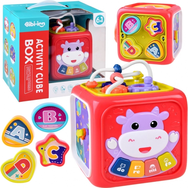 Interaktív oktató kocka zongorával, labirintussal és formaválogatóval