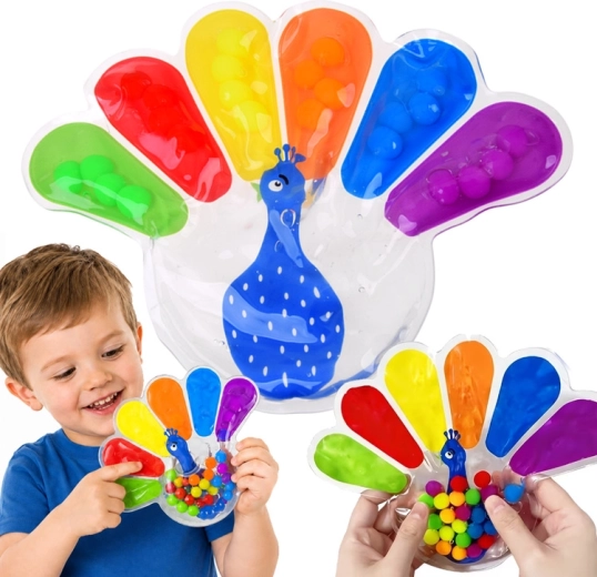 Szenzoros nyomkodós fidget játék pávás, színes golyókkal – 1 db