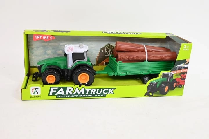 Traktor utánfutóval és farönkökkel