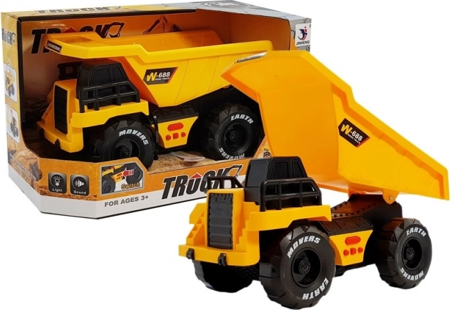 Sárga gyermek billenőplatós teherautó súrlódásos meghajtással, fényekkel és hangokkal