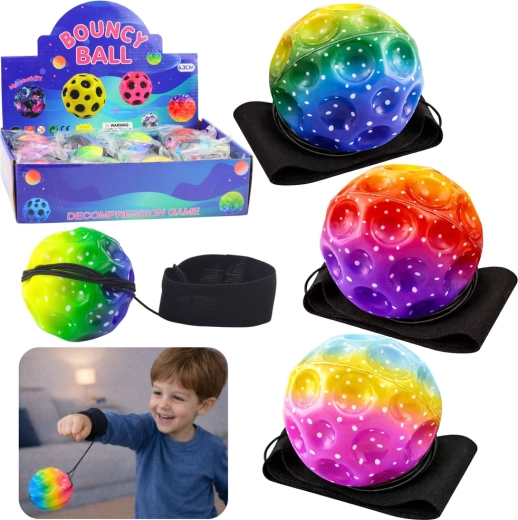 Szenzoros labda gumipórázon csuklópánttal, szivárványos, 6 cm