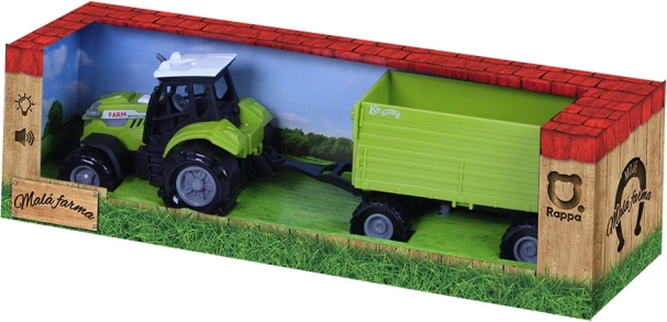 Traktor hanggal és fénnyel, utánfutóval