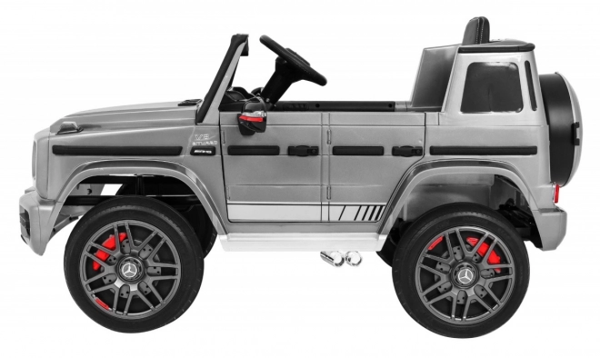 Mercedes AMG G63 gyermekeknek Ezüst festék + távirányító + MP3 LED + lassú indítás + EVA + övek