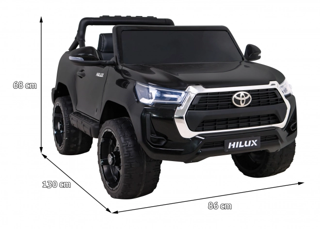 Toyota Hilux akkumulátor gyerekeknek fekete + 4x4 hajtás + távirányító + 2 csomagtartó + MP3 rádió + LED dióda