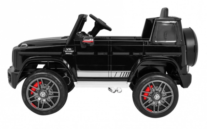 Mercedes AMG G63 gyerekeknek Lakk fekete + távirányító + MP3 LED + lassú indítás + EVA + biztonsági öv