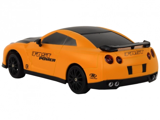 Távirányítós sportkocsi R/C 1:24 cserélhető kerekek – Sárga