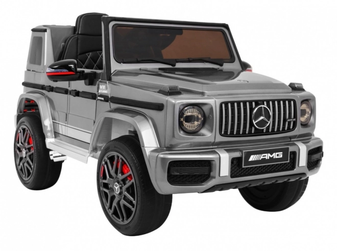 Mercedes AMG G63 gyermekeknek Ezüst festék + távirányító + MP3 LED + lassú indítás + EVA + övek