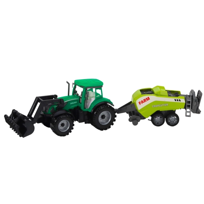 Zöld traktor rakodóval és kompatibilis bálázóval